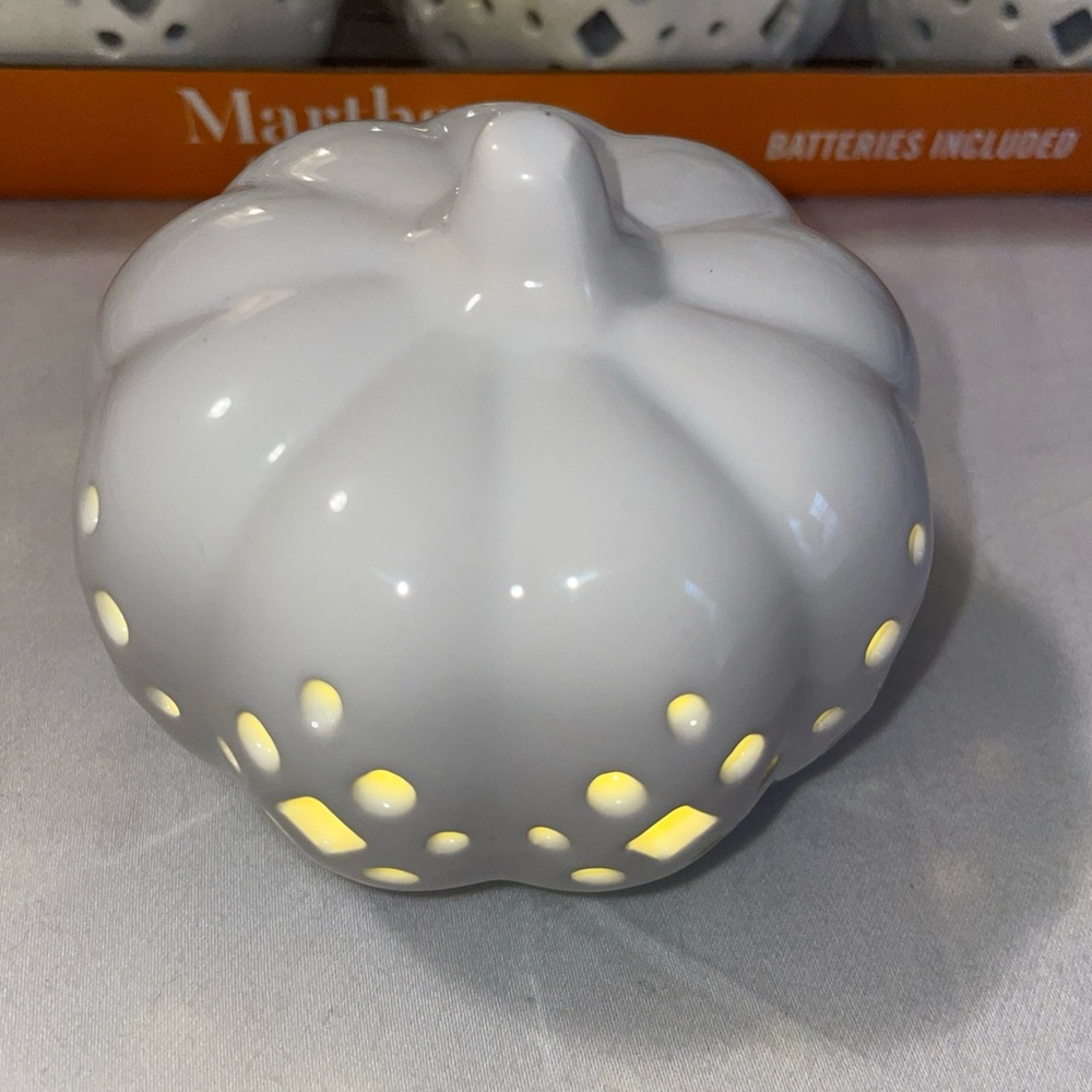 White Ceramic Pumpkin Light by Martha Stewart. 4 per package. LED lights.